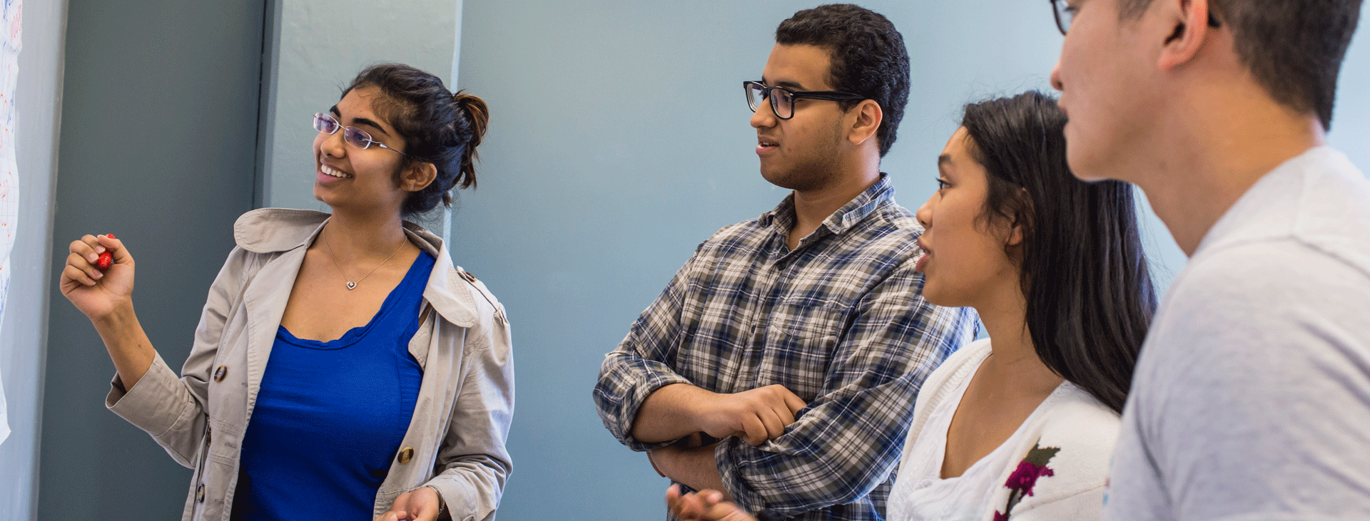 Four students discussing a topic