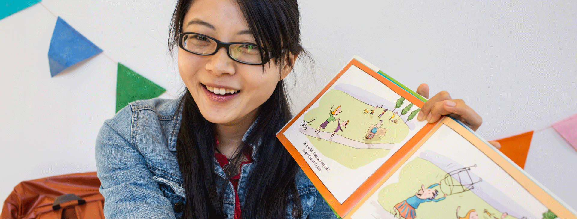 Student reading children's book