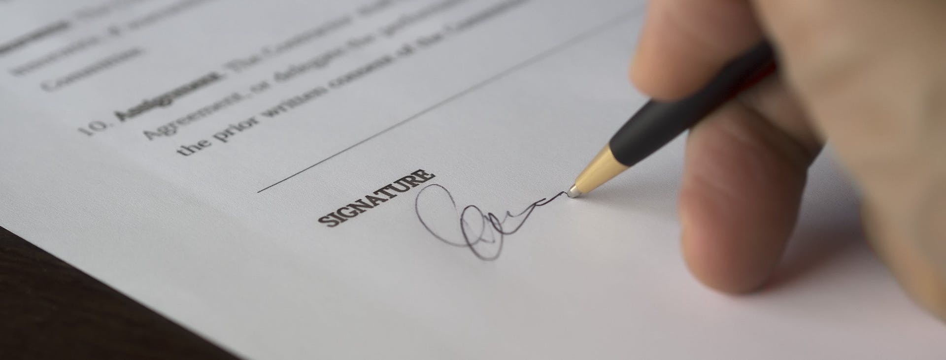Hand signing document